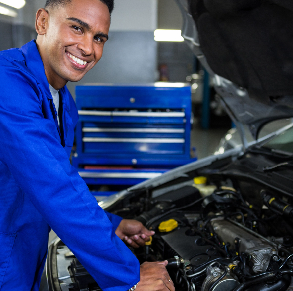 mechanic-checking-oil-level-car-engine